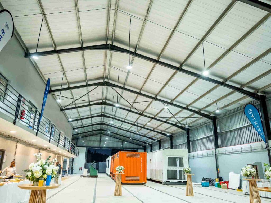 Almar Container Group specialized container modification workshop showing dry units undergoing custom structural fabrication.