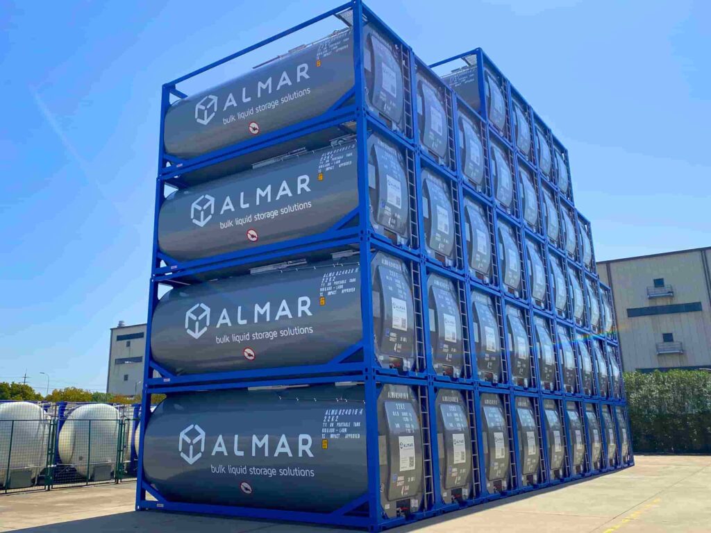 A professional stack of Almar T11 ISO tanks in a depot, showcasing bulk liquid storage capacity for the Namibian market.